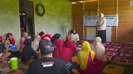 Hasma leads a gathering of the &quot;Women Fighters of Loeha&quot; to update the group on its efforts to protect their farms.