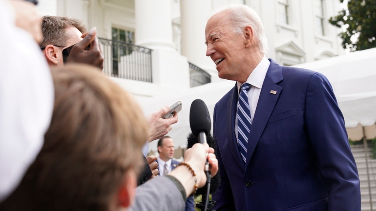 President Biden talking to reporters outside White House